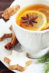  Winter spiced lemon tea. Toned image . Selective focus. 