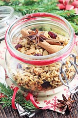 Granola with  nuts,seed mix and dried cranberries. Selective focus, toned image