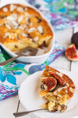 Cake with figs, sprinkled with almond.selective focus