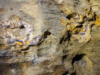 Veins of Blue John Stone readuy to be mined in caverns, Derbyshire, UK