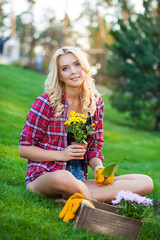 Young woman doing some gardening on a sunny day