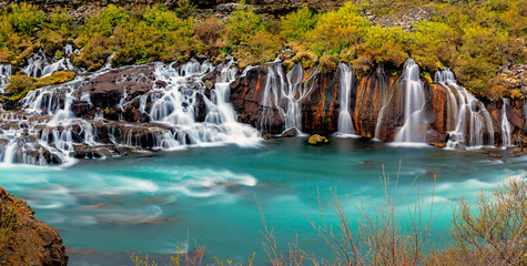 Panorama of the Hraunfossar falls in Iceland © elxeneize