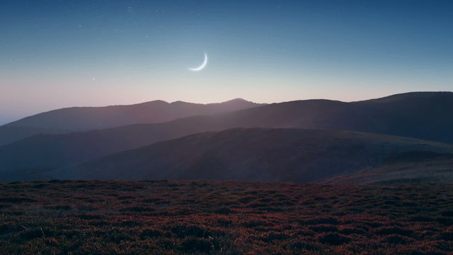 Setting moon over the mountains