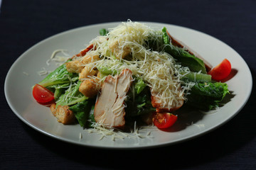 portion served in a restaurant decorated with lettuce