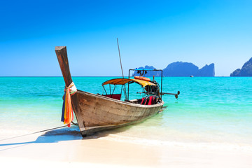 Long boat and tropical beach