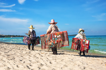 Thai women selling beachwear at beach in Koh Samui, Thailand.