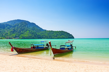 Fototapeta na wymiar Long boat and tropical beach, Thailand