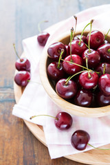 Fresh red cherries in bowl