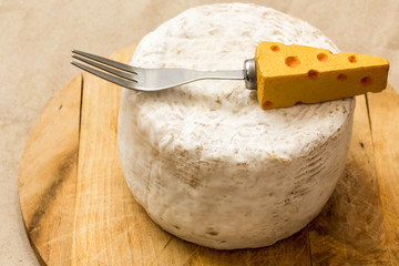 man with bycicle watching sunset at seafront