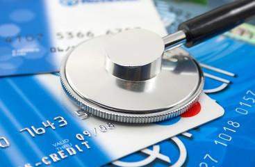 A stethoscope by a Credit cards payment