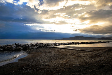 stormy clouds to the beach in autumn