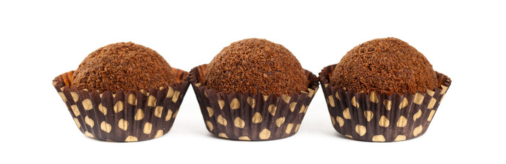 Chocolate Cocoa Honey Balls on white background. Macro with shallow dof. Selective focus.