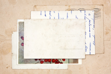 old letters, empty post cards and two hearts