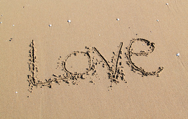 love message written on sand