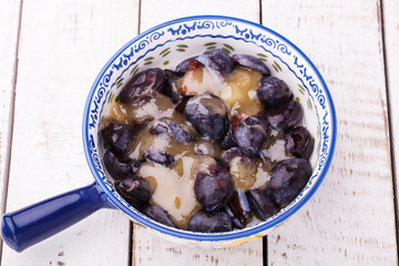 Plum crumble, lean, with nuts.selective focus