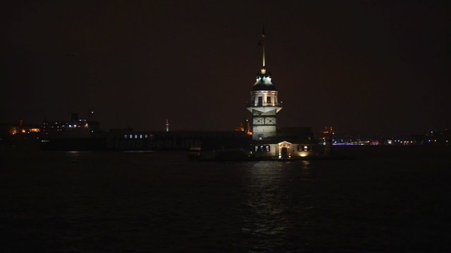Maiden's Tower or Kız Kulesi in Turkish, also known as Leander's Tower (Tower of Leandros in the Bosphorus in Turkey at night.