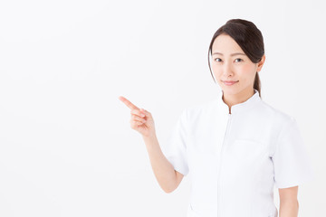 portrait of asian nurse on white background