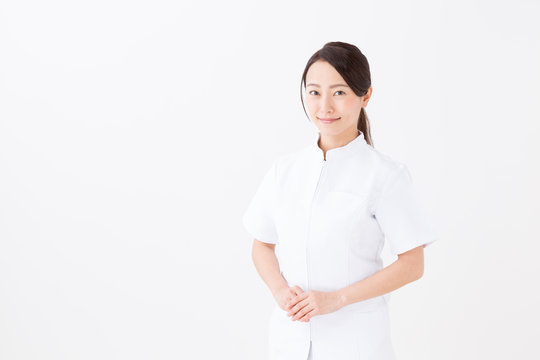 portrait of asian nurse on white background