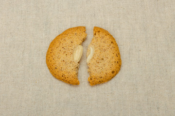 Homemade almond biscuits are broken close-up