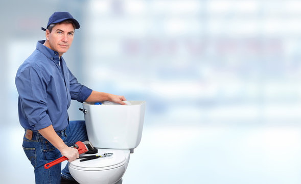 Plumber with toilet.