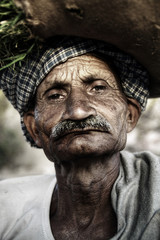 Fototapeta premium Indigenous Senior Indian Man Grumpy Camera Concept