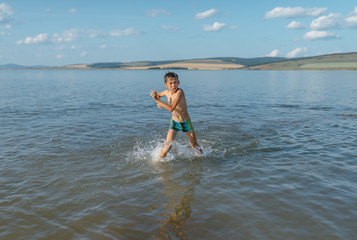 Boy in very cold water