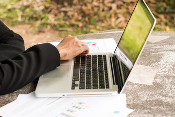 Business man working with laptop.