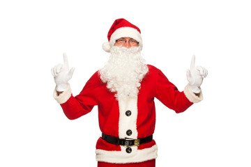 Santa Claus pointing sign with smile, isolated on white