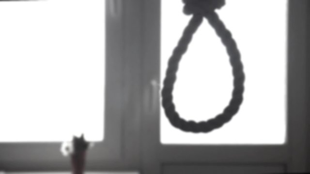 suicide, depressed man, gallows noose around his neck. With effect twitches