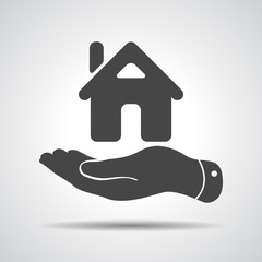 flat hand showing the icon of home - vector illustration