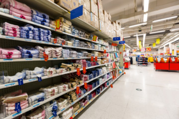 supermarket aisle,  fuzzy background。