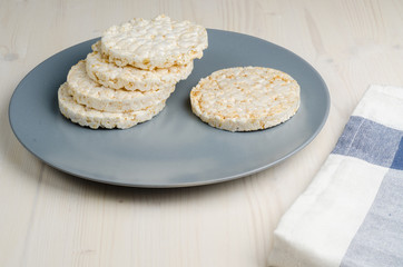 rice cake, puffed rice on table 
