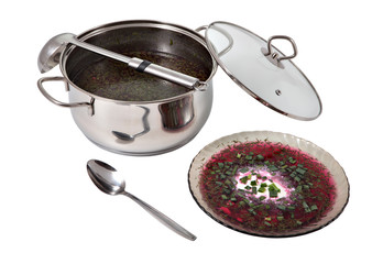Cooker with beetroot cold  soup and plate of broth.