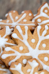 Decorated Christmas cookies over wood