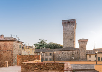 
the ancient walls of the city of Lucignano in Tuscany