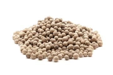 Pile of Organic White Pepper (Piper nigrum) isolated on white background.
