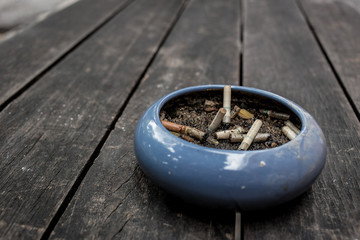ashtray on wood table