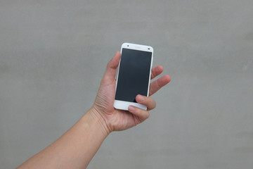 Hand with mobile phone