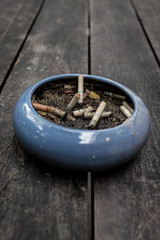 ashtray on wood table