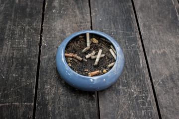 ashtray on wood table