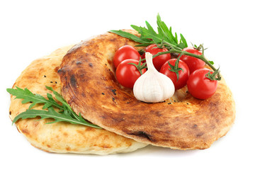 Pita bread and vegetables isolated on white