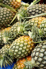 a lot of pineapple in market
