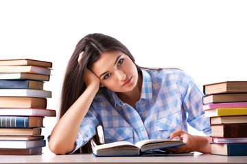 Young girl with books isolated on white