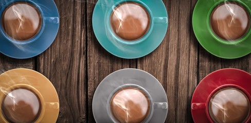 Overhead view of various colorful tea cups