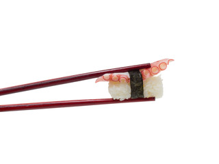 Sushi nigiri in brown chopsticks isolated on white background