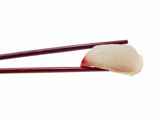 Sushi nigiri in brown chopsticks isolated on white background