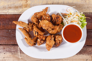 A plate of fresh, hot, crispy fried chicken