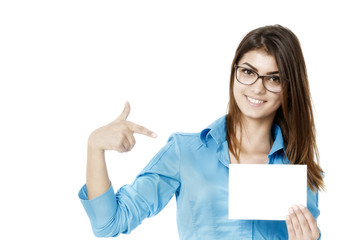 Naklejka premium Business woman showing on copyspace. Isolated white.