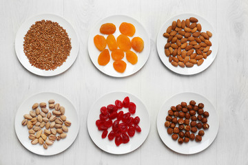 Set of different products on wooden background