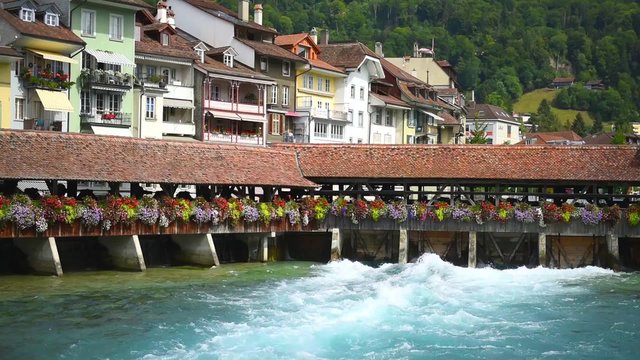 Bridge with a water gate in Thun town in Switzerland